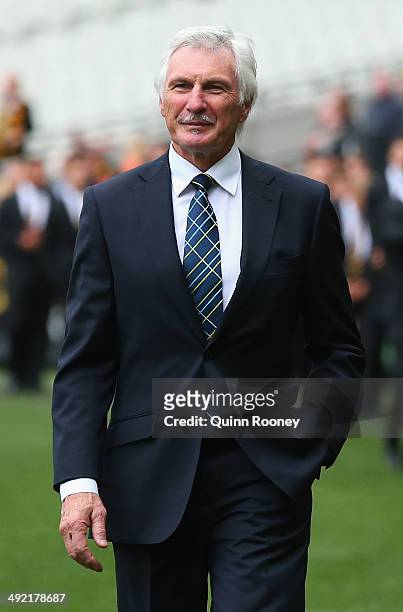 Michael Malthouse walks around the boundary to form a guard of honour during the public service for Tom Hafey at Melbourne Cricket Ground on May 19,...