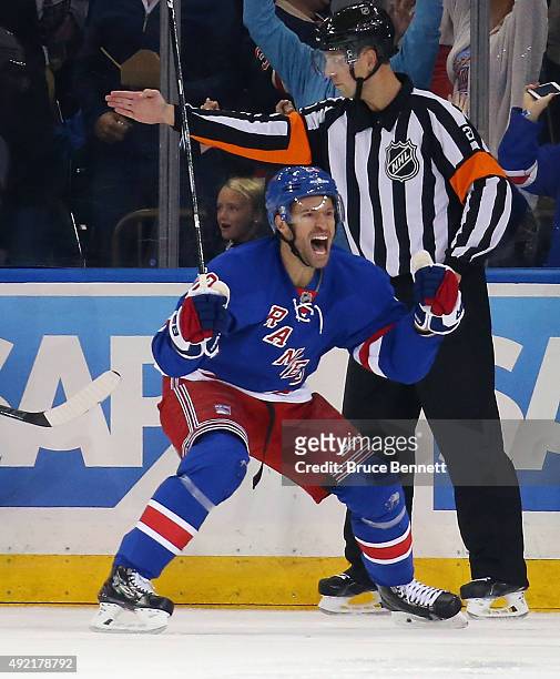 Dominic Moore of the New York Rangers celebrates his goal at 5:28 of the first period against the Columbus Blue Jackets at Madison Square Garden on...