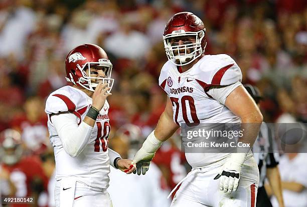 Brandon Allen of the Arkansas Razorbacks reacts after passing for a touchdown against the Alabama Crimson Tide with Dan Skipper at Bryant-Denny...