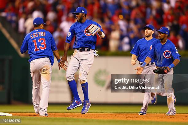 Starlin Castro of the Chicago Cubs celebrates with Dexter Fowler of the Chicago Cubs after the Chicago Cubs defeat the St. Louis Cardinals in game...