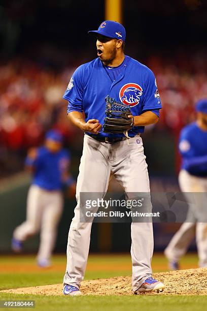 Hector Rondon of the Chicago Cubs celebrates defeating the St. Louis Cardinals in game two of the National League Division Series at Busch Stadium on...