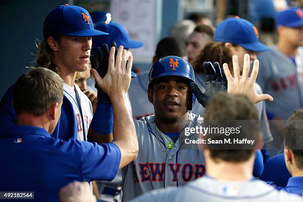 Yoenis Cespedes of the New York Mets celebrates after hitting a solo home run in the second inning against the Los Angeles Dodgers in game two of the...