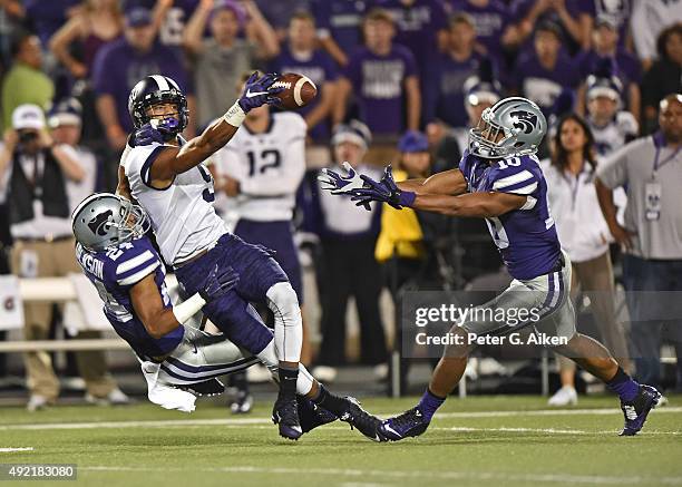 Defensive back Nate Jackson of the Kansas State Wildcats brakes up a pass intended for wide receiver Josh Doctson of the TCU Horned Frogs during the...