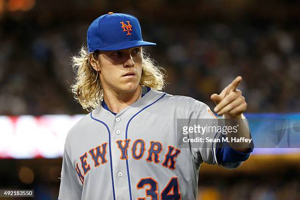 Noah Syndergaard of the New York Mets reacts after recording the final out of the second inning against the Los Angeles Dodgers in game two of the...