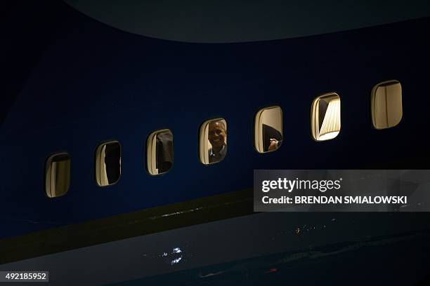 President Barack Obama waits in Air Force One after arriving at Marine Corps Air Station Miramar October 10, 2015 in California. AFP PHOTO/ BRENDAN...