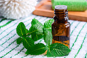 Small bottle of essential mint oil