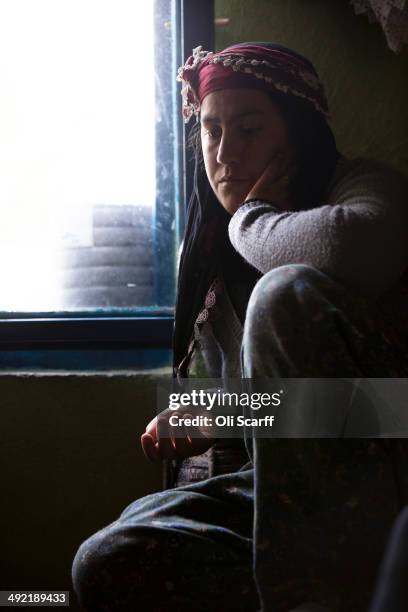 The wife of miner Ilkay Yildrim, who died in the explosion at Soma mine, grieves in her home in the hamlet of Elmadere close to the mine works on May...