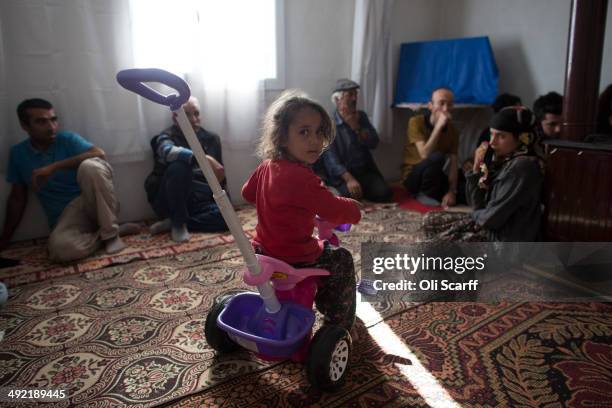 The daughter and relatives of miner Turgut Jilmaz, who died in the explosion at Soma mine, grieve in their home in the hamlet of Elmadere close to...