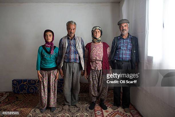 Relatives of miner Turgut Jilmaz, who died in the explosion at Soma mine, grieve in their home in the hamlet of Elmadere close to the mine works on...
