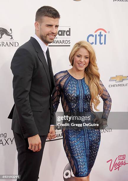 Singer Shakira and Gerard Pique arrive at the 2014 Billboard Music Awards at the MGM Grand Garden Arena on May 18, 2014 in Las Vegas, Nevada.