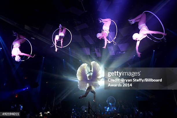 Cirque du Soleil performs during the Official After-Party for the 2014 Billboard Music Awards at The Light at Mandalay Bay Casino and Resort on May...