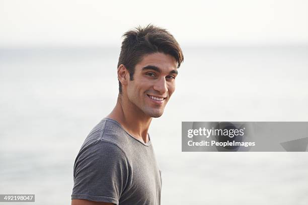 time off at the beach - handsome hunks stock pictures, royalty-free photos & images