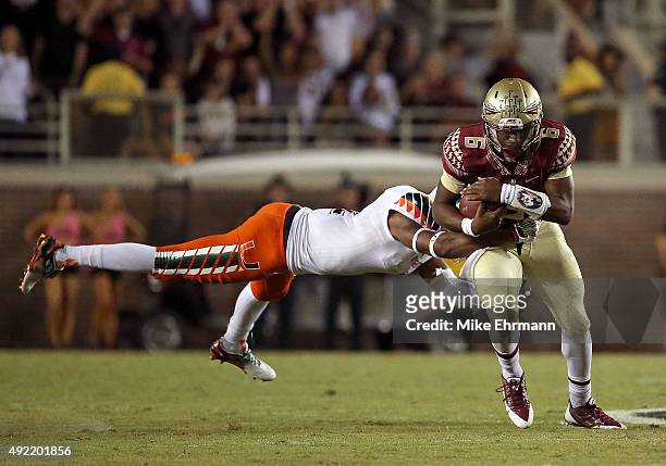Everett Golson of the Florida State Seminoles rushes during a game against the Miami Hurricanes at Doak Campbell Stadium on October 10, 2015 in...