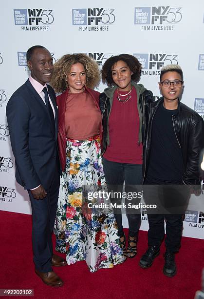 Don Cheadle, Bridgid Coulter, Imani Cheadle and Ayana Tai Cheadle attend the 53rd New York Film Festival closing night gala screening of "Miles...