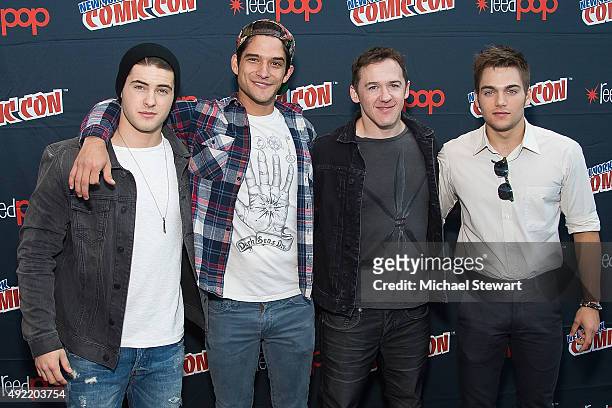 Cody Christian, Tyler Posey, Jeff Davis and Dylan Sprayberry pose in the press room for "Teen Wolf" during New York Comic-Con Day 3 at The Jacob K....