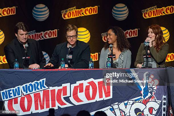 Actors Nathan Fillion, Alan Tudyk, Gina Torres and Jewel Staite attend the "Firefly Reunion" panel during New York Comic-Con Day 3 at The Jacob K....