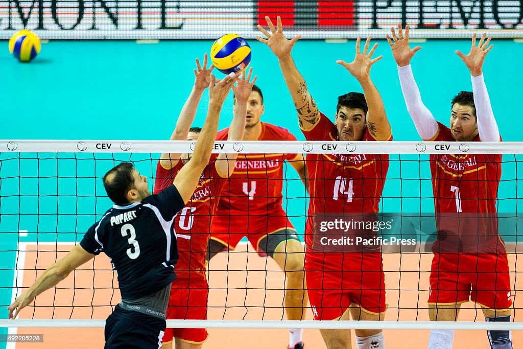 Keith Pupart (3) , Outside-spiker of Estonia places the ball...