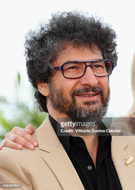 Producer Radu Mihaileanu attends the "Caricaturistes - Fantassins De La Democratie" photocall at the 67th Annual Cannes Film Festival on May 19, 2014...