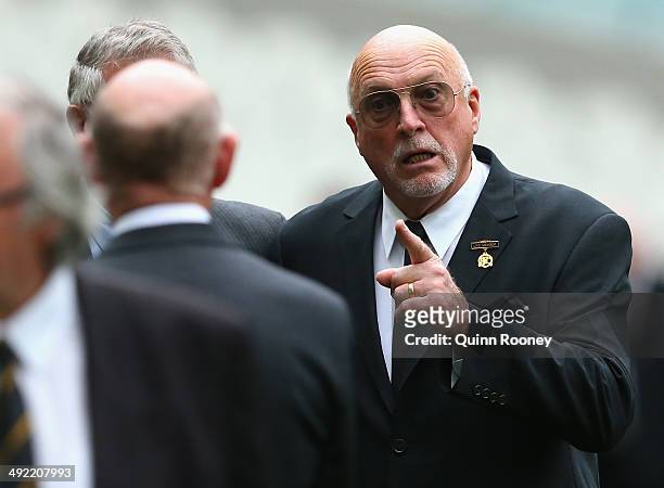Rex Hunt speaks to Kevin Bartlett during the public service for Tom Hafey at Melbourne Cricket Ground on May 19, 2014 in Melbourne, Australia. Hafey...