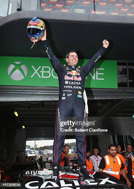 Craig Lowndes driver of the Red Bull Racing Australia Holden celebrates after he and co driver Steven Richards won the Bathurst 1000, which is race...