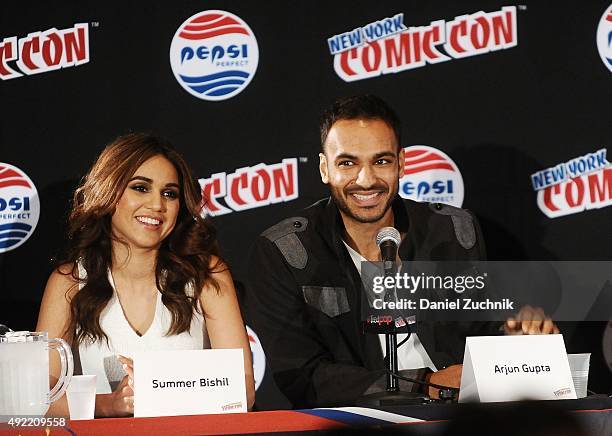 Summer Bishil and Arjun Gupta attend 'The Magicians' panel during New York Comic-Con 2015 at The Jacob K. Javits Convention Center on October 10,...