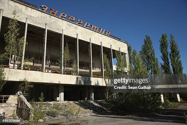 The abandoned "Energetik" cultural center, that once housed a library, lecture halls and sports facilities, stands on the former main square...