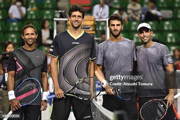 Raven Klaasen of South Africa, Marcelo Melo of Brazil, Robert Farah of Colombia, and Juan Sebastian Cabal of Colombia pose for photographs before the...