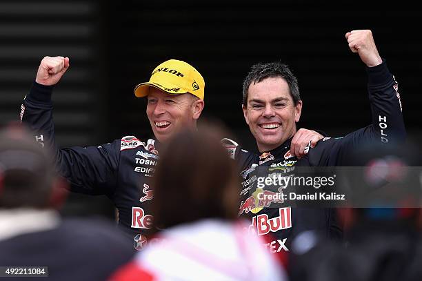 Craig Lowndes driver of the Red Bull Racing Holden VF Commodore and Steven Richards driver of the Red Bull Racing Holden VF Commodore celebrate in...