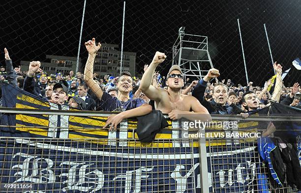 Bosnia and Herzegovina's supporters wave after the Euro 2016 qualifying football match between Bosnia and Herzegovina and Wales, in Zenica, on...