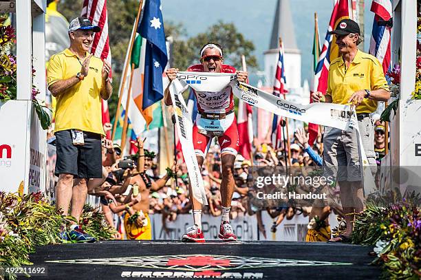 In this handout photograph provided by Ironman, Jan Frodeno of Germany celebrates winning the 2015 IRONMAN World Championship presented by GoPro on...