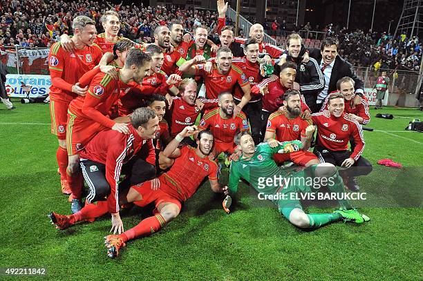 Wales' players pose after the Euro 2016 qualifying football match between Bosnia and Herzegovina and Wales, in Zenica, on October 10, 2015. The...