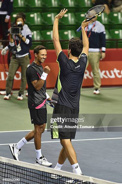 Raven Klaasen of South Africa and Marcelo Melo of Brazil celebrate after winning the men's doubles final match against Juan Sebastian Cabal of...