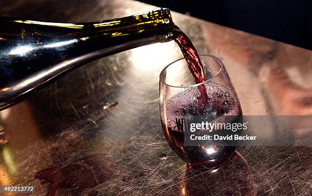 Bartender pours a glass of wine at the 10th annual Wine Amplified festival at the Las Vegas Village on October 10, 2015 in Las Vegas, Nevada.