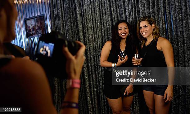 Guests are photographed inside the New Amsterdam Speakeasy at the 10th annual Wine Amplified festival at the Las Vegas Village on October 10, 2015 in...