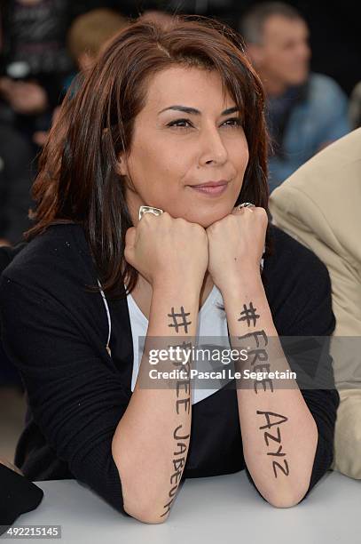 Cartoonist Nadia Khiari aka "Willis from Tunis" attends the "Caricaturistes - Fantassins De La Democratie" photocall at the 67th Annual Cannes Film...