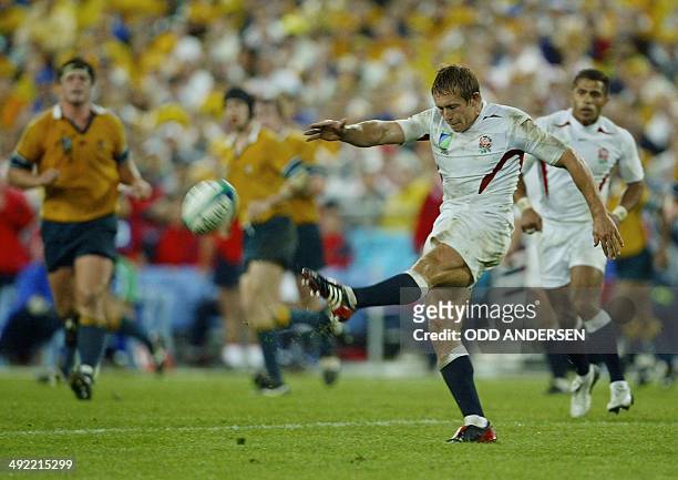 English fly-half Jonny Wilkinson nails a drop kick goal during the Rugby World Cup final between Australia and England at the Olympic Park Stadium in...