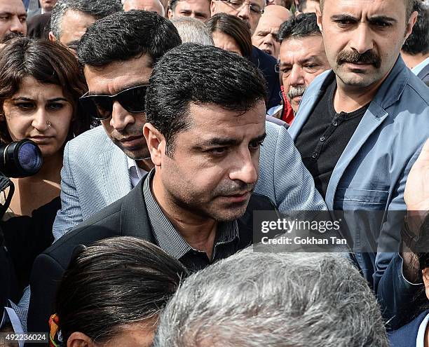 Selahattin Demirtas, co-leader of the pro Kurdish Democratic Party of Peoples walks through the crowd on October 11, 2015 in Ankara, Turkey. Scuffles...