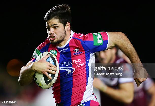 Jake Mamo of the Knights makes a break during the round 10 NRL match between the Manly-Warringah Sea Eagles and the Newcastle Knights at Brookvale...