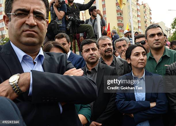 Selahattin Demirtas, and Figen Yuksekdag , co-leaders of the pro Kurdish Democratic Party of Peoples attend the funeral of Korkmaz Tedik, a victim of...