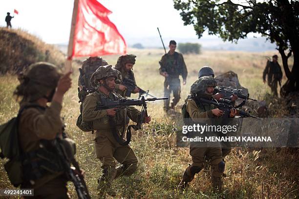 Israeli soldiers of the Ultra-Orthodox battalion "Netzah Yehuda" take part in their annual unit training in the Israeli annexed Golan Heights, near...