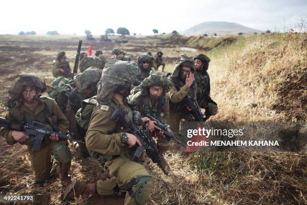 Israeli soldiers of the Jewish Ultra-Orthodox battalion "Netzah Yehuda" take part in their annual unit training in the Israeli annexed Golan Heights,...