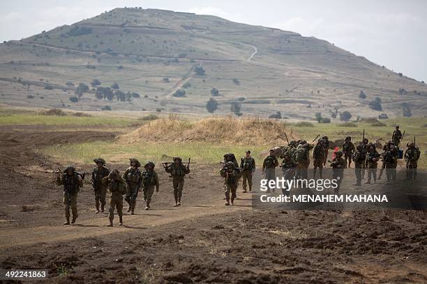 Israeli soldiers of the Jewish Ultra-Orthodox battalion "Netzah Yehuda" take part in their annual unit training in the Israeli annexed Golan Heights,...