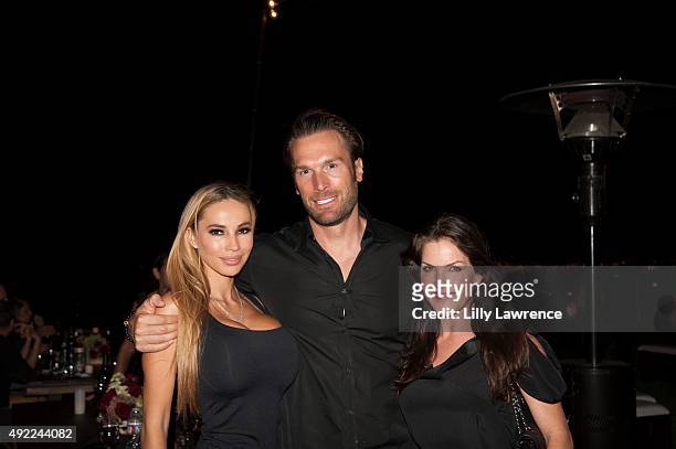 Maria and Bastian Yotta and Kira Reed Lorsch attend Victorino Noval birthday celebration at The Vineyard Beverly Hills on October 10, 2015 in Beverly...