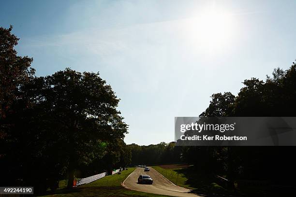 General view as the field go into Stirlings during Race Two of the Final Round of the Dunlop MSA British Touring Car Championship at Brands Hatch on...