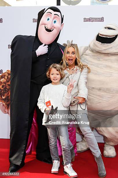 Xenia Seeberg and her son Philias Seeberg attend the 'Hotel Transsilvanien 2' German Premiere on October 11, 2015 in Berlin, Germany.