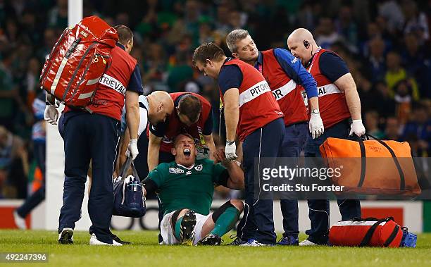 Paul O'Connell of Ireland reacts as he receives medical treatment during the 2015 Rugby World Cup Pool D match between France and Ireland at...