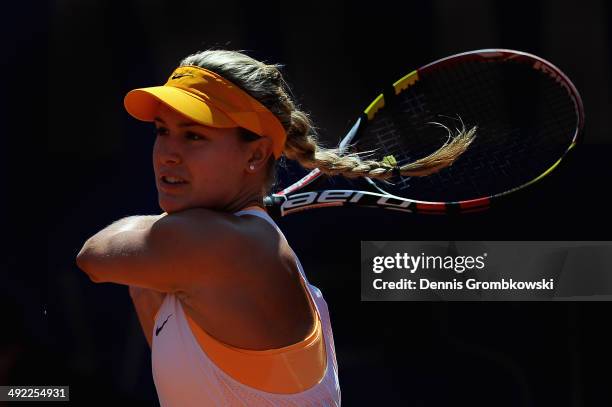 Eugenie Bouchard of Canada plays a backhand in her match against Barbora Zahlavova Strycova of Czech Republic during Day 3 of the Nuernberger...