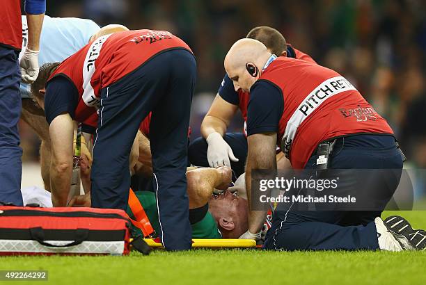 Paul O'Connell of Ireland receives medical treatment during the 2015 Rugby World Cup Pool D match between France and Ireland at Millennium Stadium on...