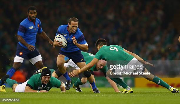 Frederic Michalak of France is tackled by Conor Murray of Ireland during the 2015 Rugby World Cup Pool D match between France and Ireland at...