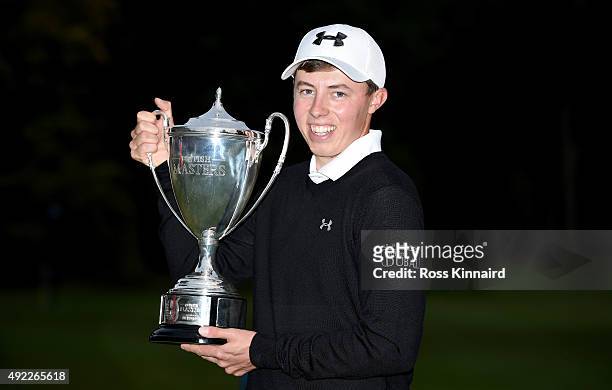 Matthew Fitzpatrick of England with the winners trophy after the final round of the British Masters at Woburn Golf Club on October 11, 2015 in...